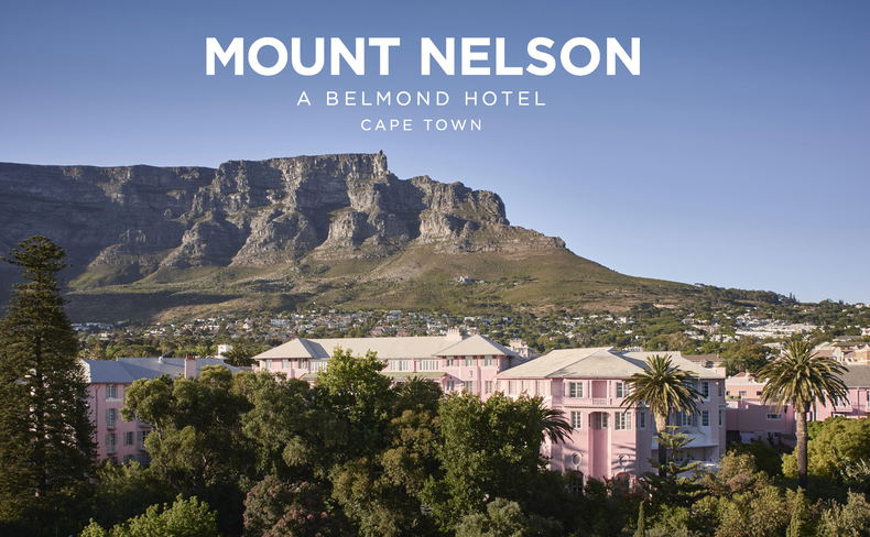 exterior view of the Mount Nelson Hotel Cape Town underneath table mountain in background with logo overlay exterior view of the Mount Nelson Hotel Cape Town underneath table mountain in background with logo overlay