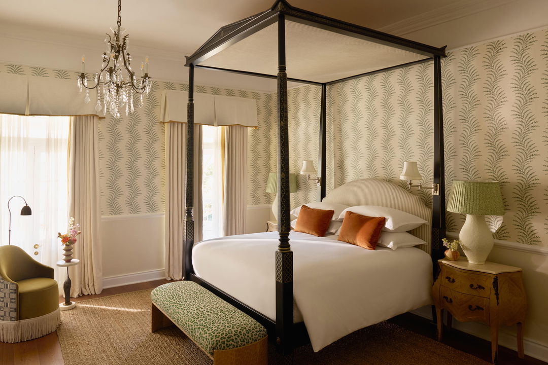 four post bed in bedroom of mount nelson hotel cape town