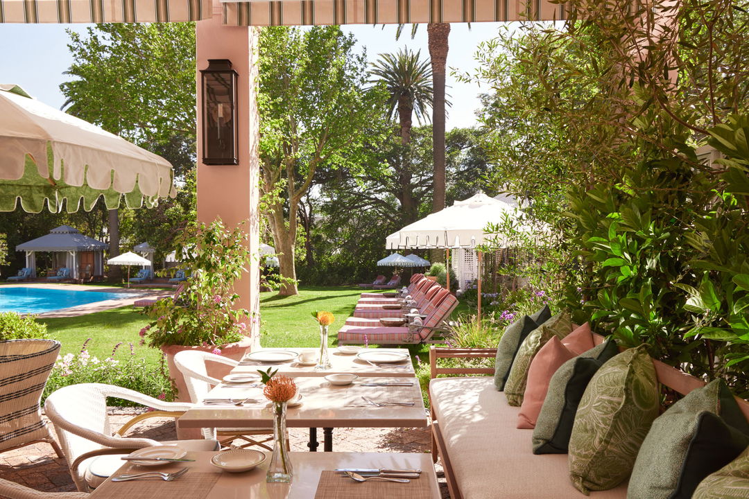 high tea setting on terrace of Mount Nelson hotel Cape Town
