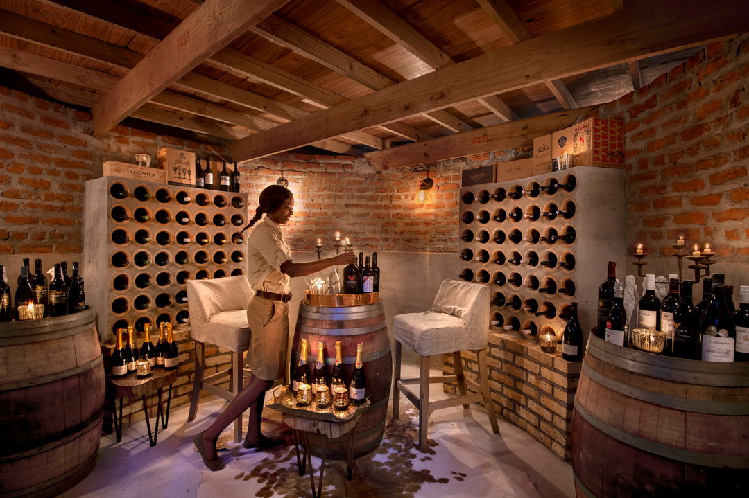 sommelier in wine cellar of Nyamatusi Camps Mana Pools Zimbabwe 