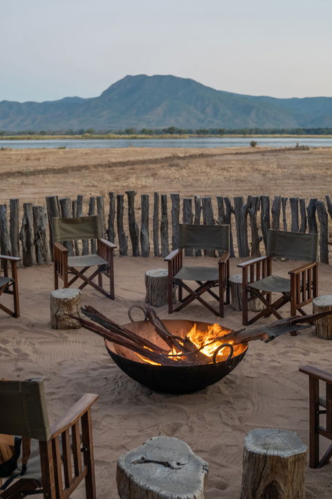firepit at sunset with views at Nyamatusi Camps Mana Pools Zimbabwe 