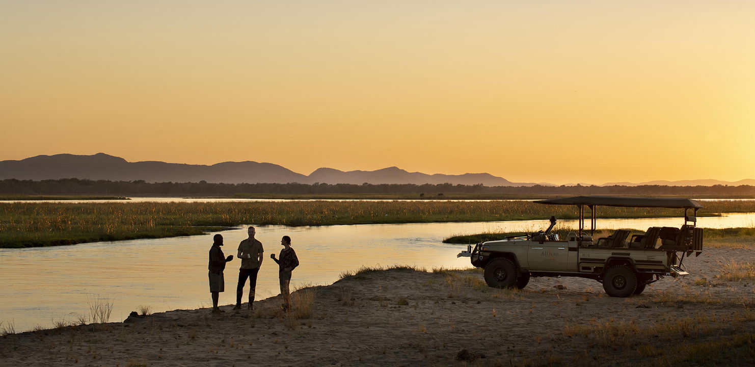 game drive sundowner stop by river at Nyamatusi Camps Mana Pools Zimbabwe 