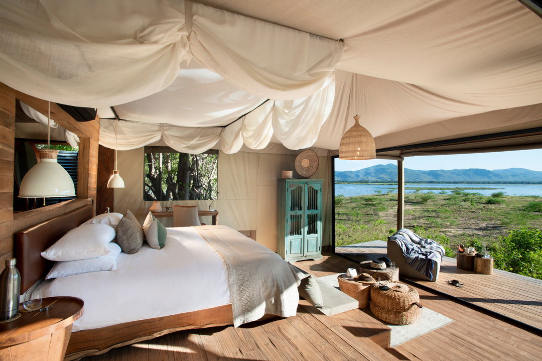 view from bedroom onto deck and views by Nyamatusi Camps Mana Pools Zimbabwe 