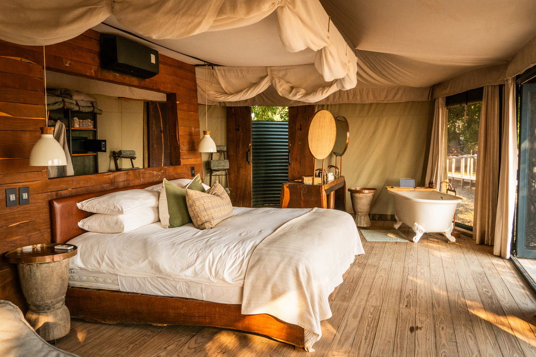bed in bedroom of a suite by Nyamatusi Camps Mana Pools Zimbabwe 