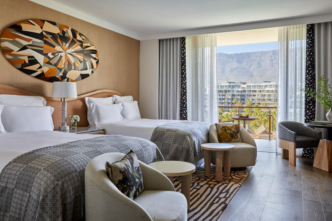 interior view of luxury bedroom with table mountain views at One&Only Resort Waterfront Cape Town