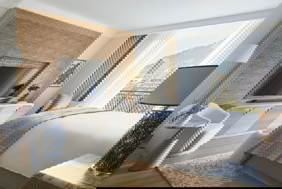 interior view of luxury bedroom with waterfront views at One&Only Resort Waterfront Cape Town