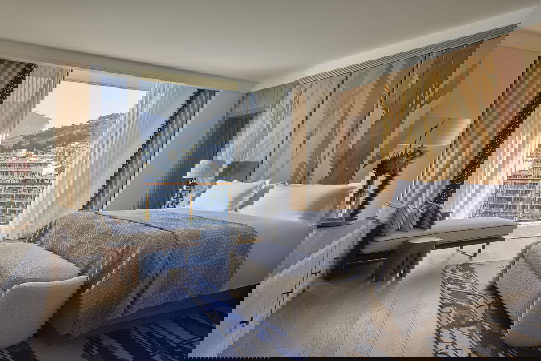 interior view of luxury bedroom with waterfront views at One&Only Resort Waterfront Cape Town