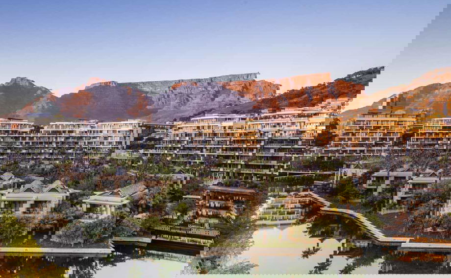 exterior sunset view of resort from above at One&Only Resort Waterfront Cape Town