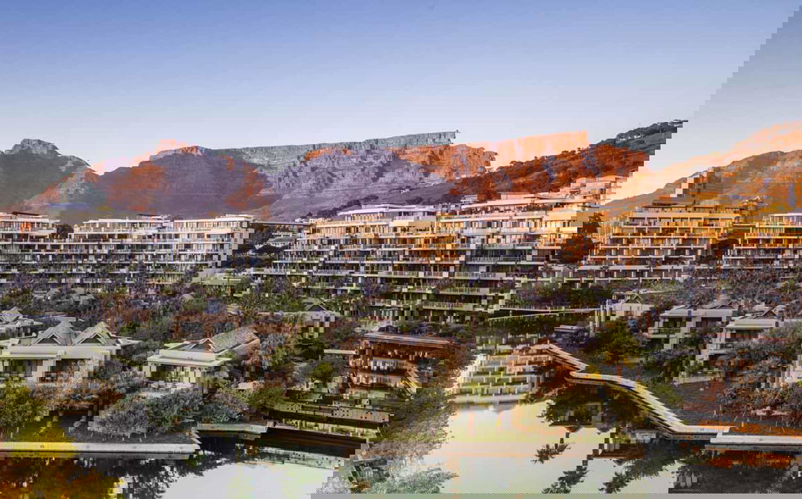 exterior sunset view of resort from above at One&Only Resort Waterfront Cape Town
