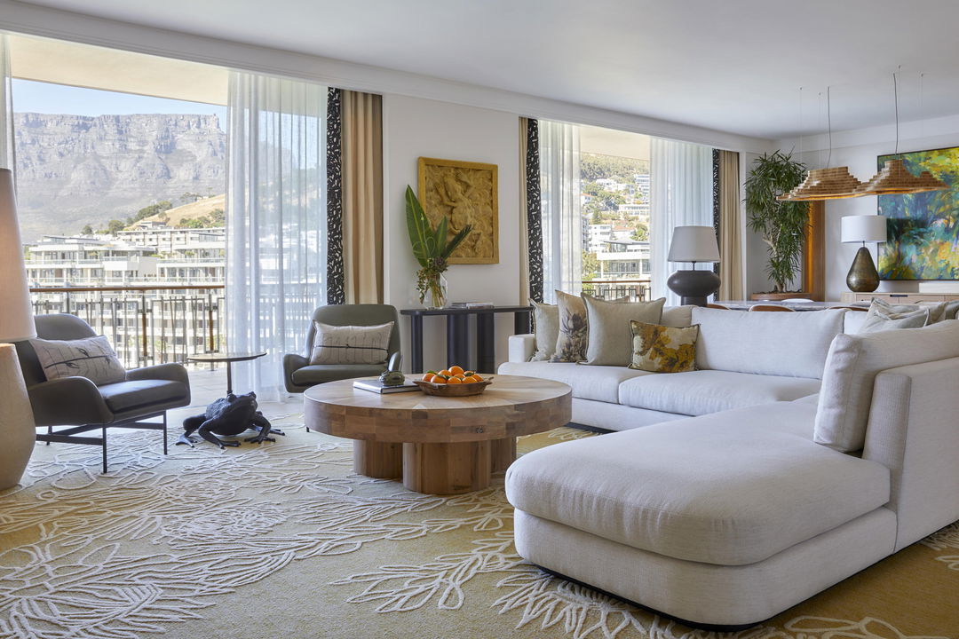 interior view of luxury bedroom lounge area with views at One&Only Resort Waterfront Cape Town