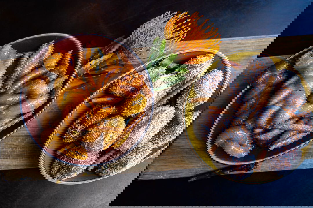 gourmet food presented in artistic plates at One&Only Resort Waterfront Cape Town