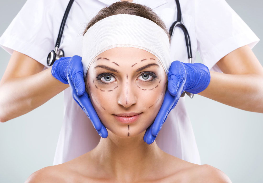  lady face held by hands with gloves of doctor
