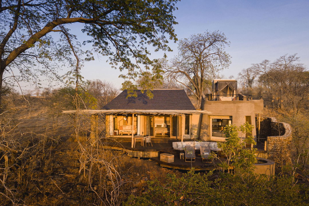 exterior  view of suite at sunset by Puku Ridge Camp Zambia Luangwa Plains