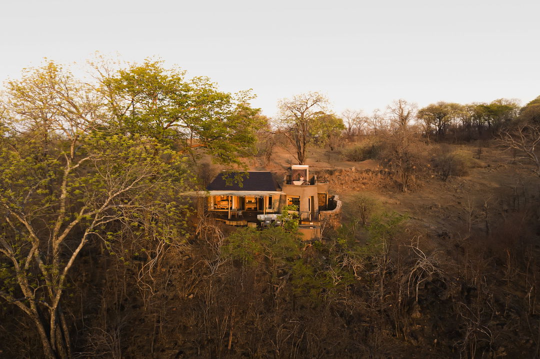 exterior view of tented suite at sunset by Puku Ridge Camp Zambia Luangwa Plains