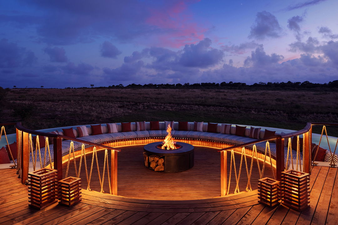 firepit at night by ritz carlton masai mara