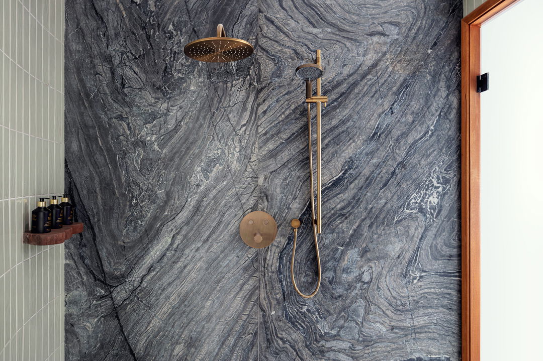 inside a shower in a suite of ritz carlton masai mara