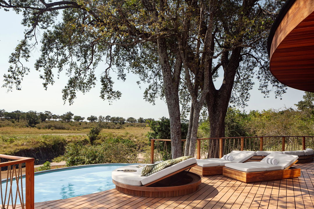 spalsh pool and deck seating at ritz carlton masai mara