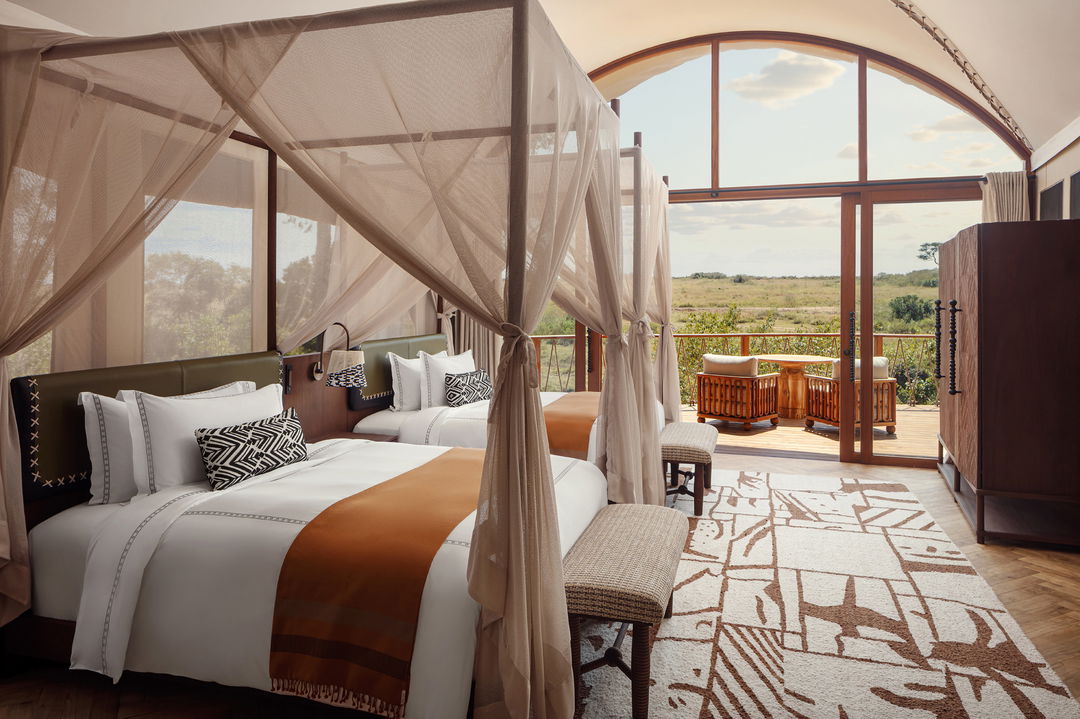 bedroom interior view of a suite at ritz carlton masai mara
