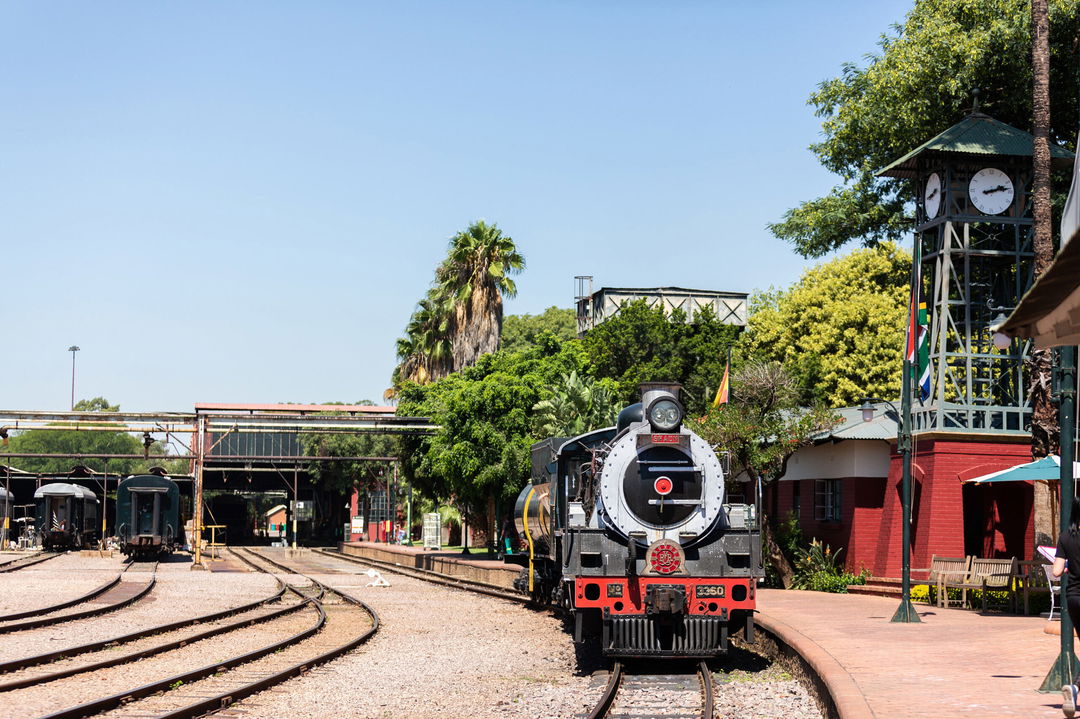 train departing main station with Rovos Rail Luxury Trains