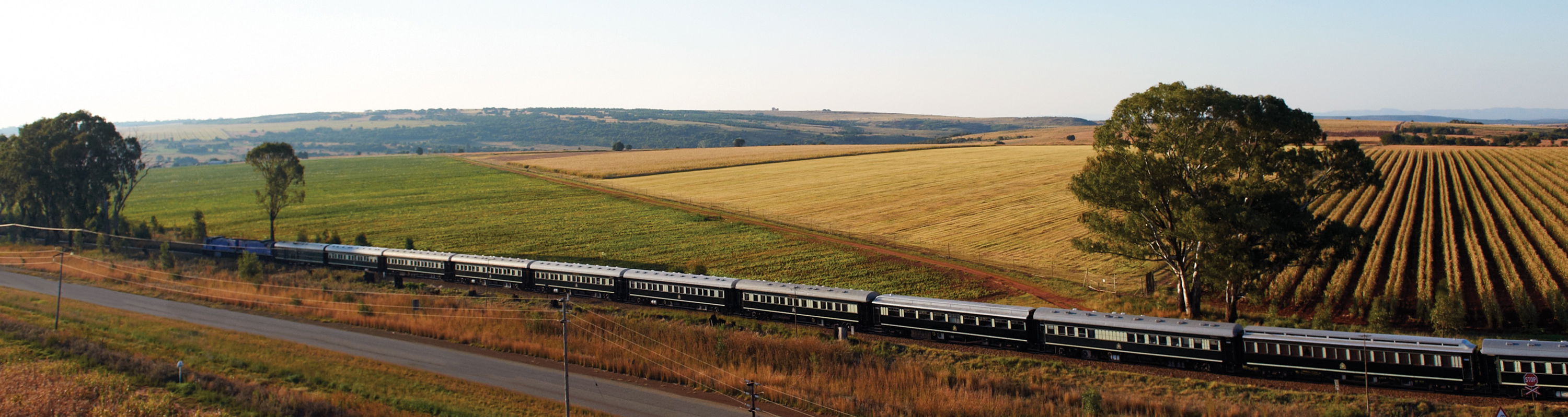 Rovos rail train on tracks gliding through the north west province in south Africa