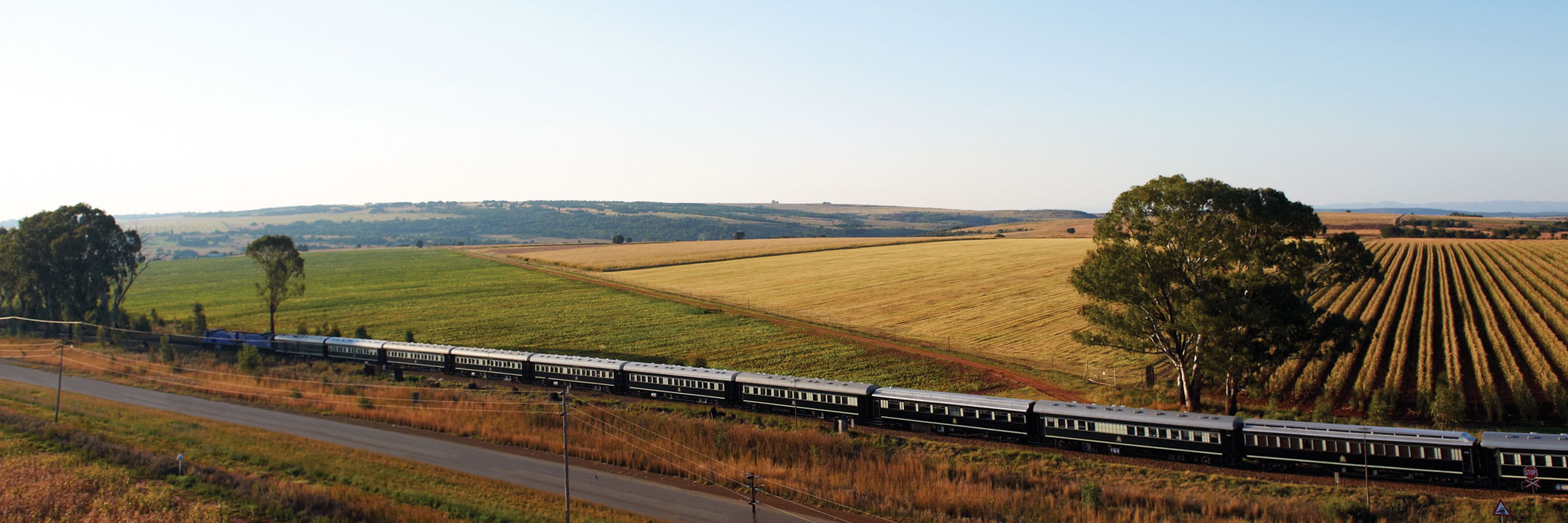 Rovos rail train on tracks gliding through the north west province in south Africa