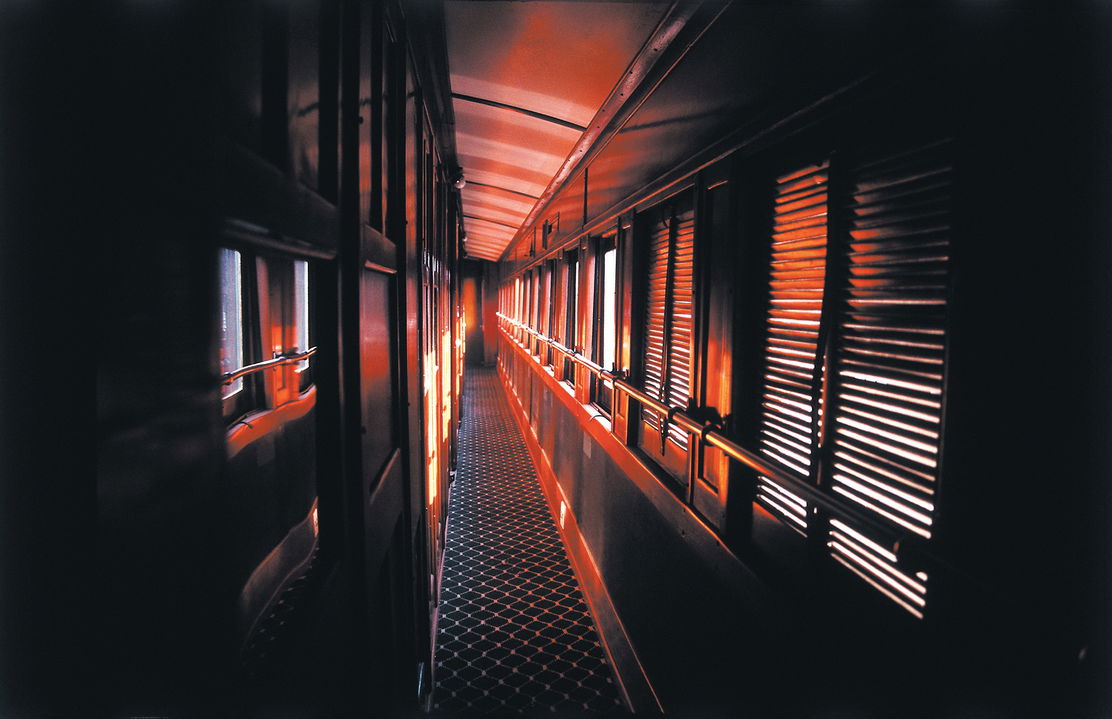 afternoon view of the passage of rovos rail luxury trains towards cabins