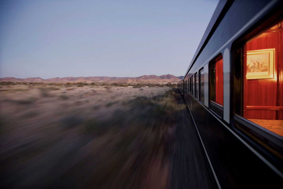 looking from the back of the train ahead to front cars at Rovos rail luxury train safaris