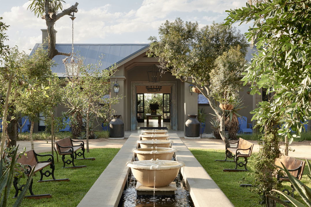 walkway and entrance to farmstead lodge royal malewane