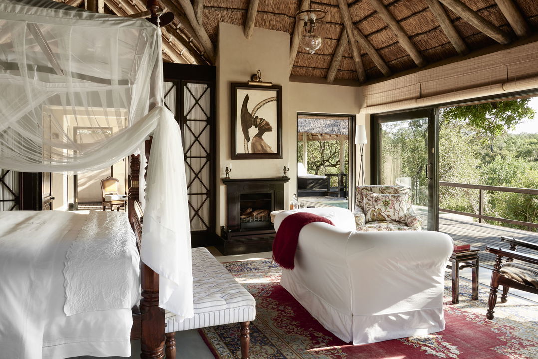 view of luxury suite bedroom at royal malewane lodge