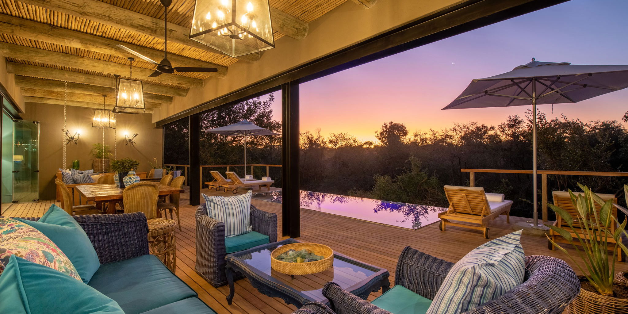 interior and deck view of baobab suite at Royal Malewane waterside lodge