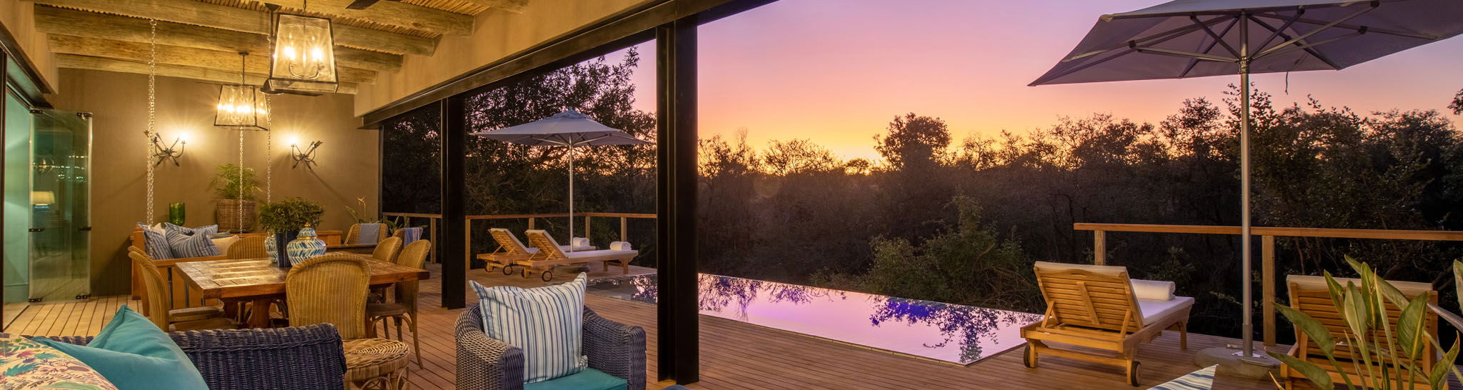 interior and deck view of baobab suite at Royal Malewane waterside lodge