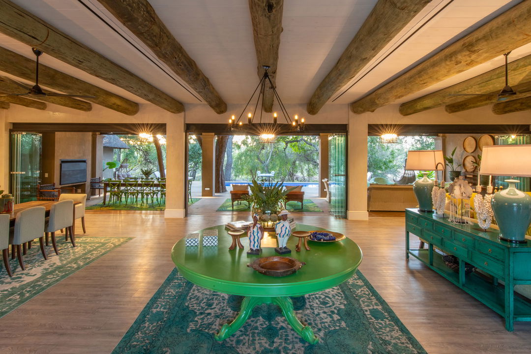 Royal Malewane Waterside House Entrance with green table in foreground