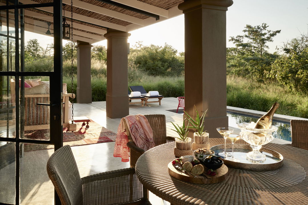 Royal Malewane Farmstead Dining deck with table and chair