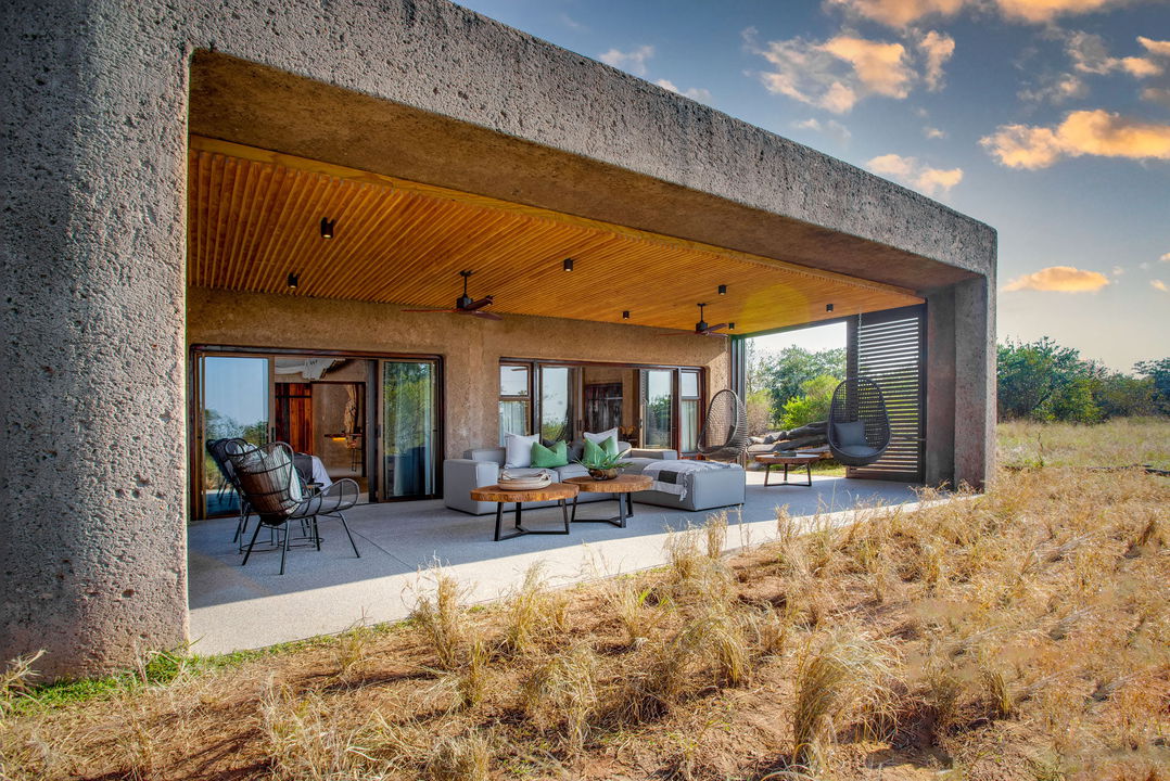 exterior view of amber villa at daytime by sabi sabi earth lodge
