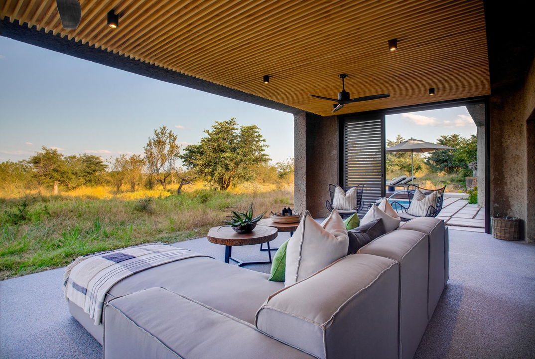 terrace view of amber villa with bush view at sabi sabi earth lodge
