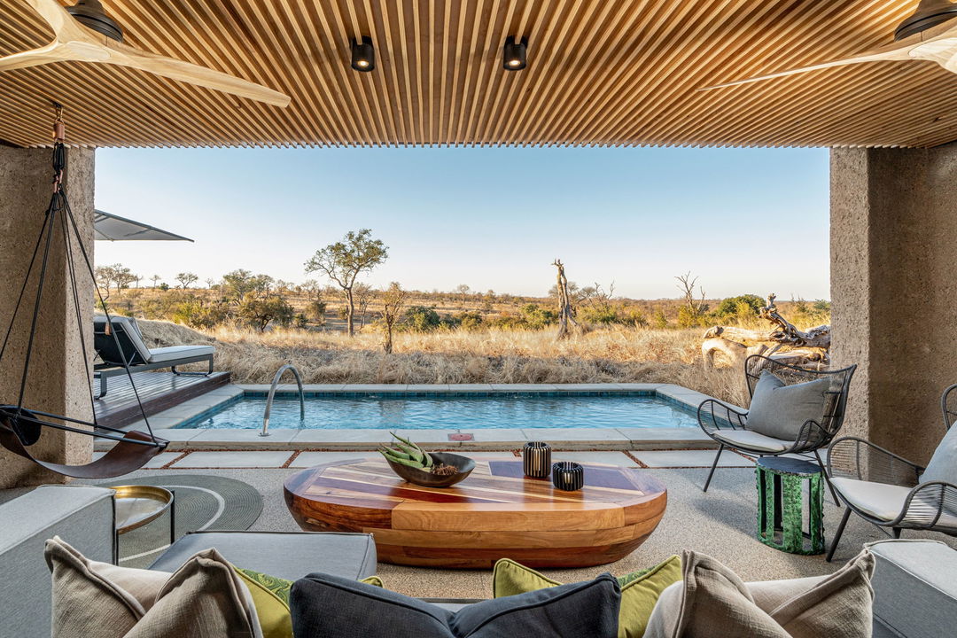 terrace and deck with pool at sabi sabi earth lodge