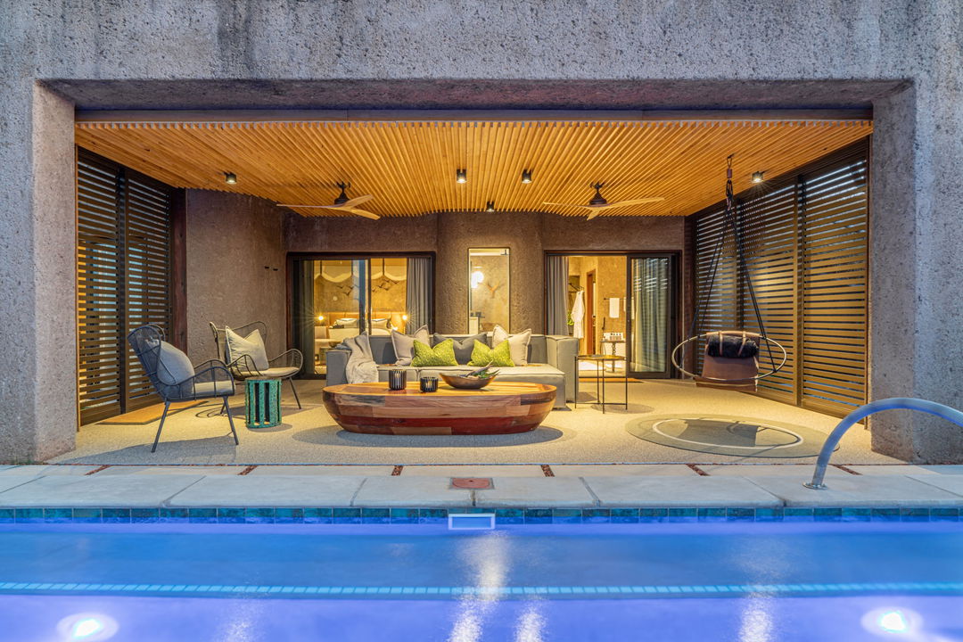 sabi sabi earth lodge luxury suite exterior view with pool in foreground