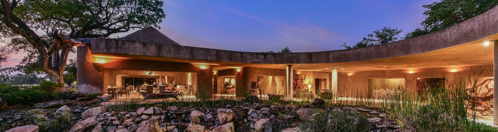 sunset view from outside of sabi sabi earth lodge