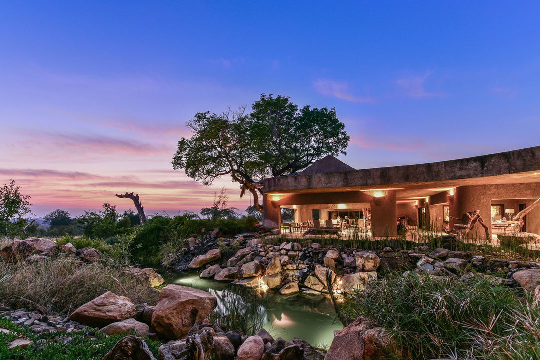 exterior evening view of sabi sabi earth lodge