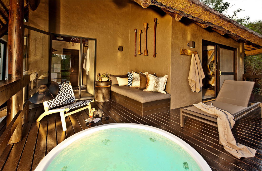 heated spa bath at luxury suite of little bush camp sabi sabi
