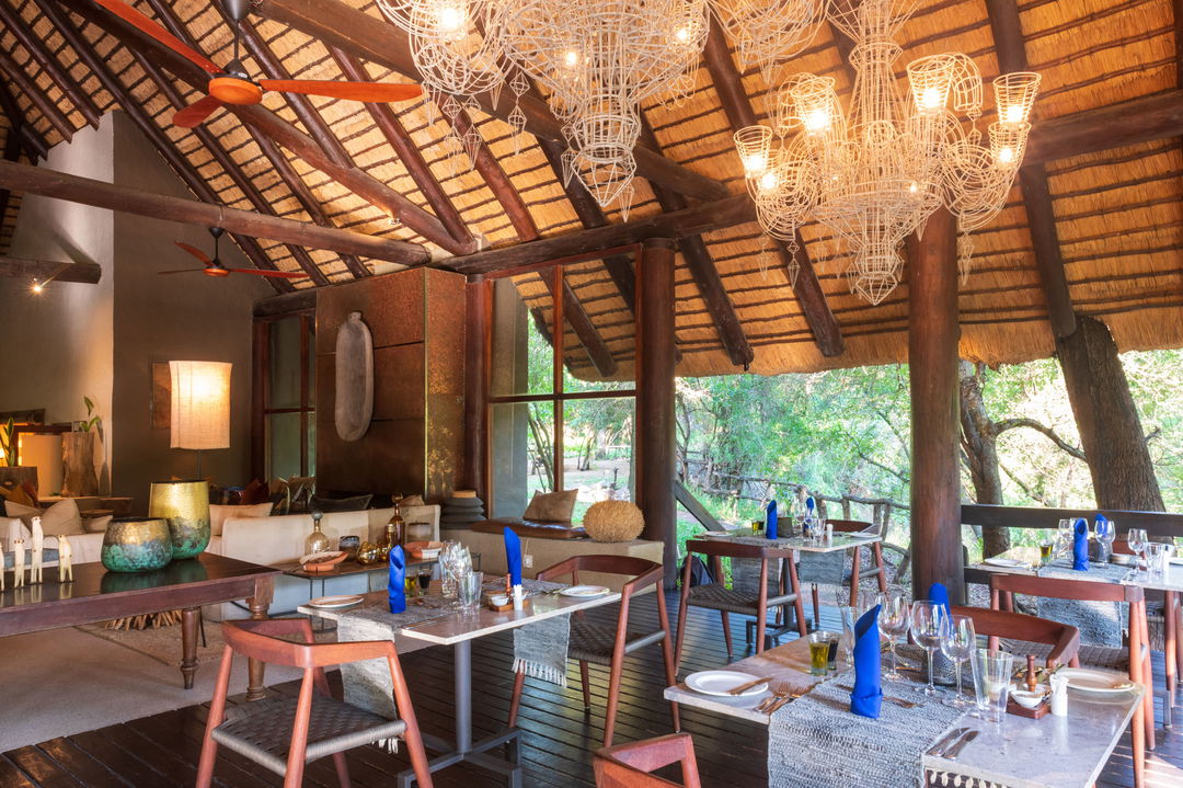 dining table in lounge of sabi sabi little bush camp