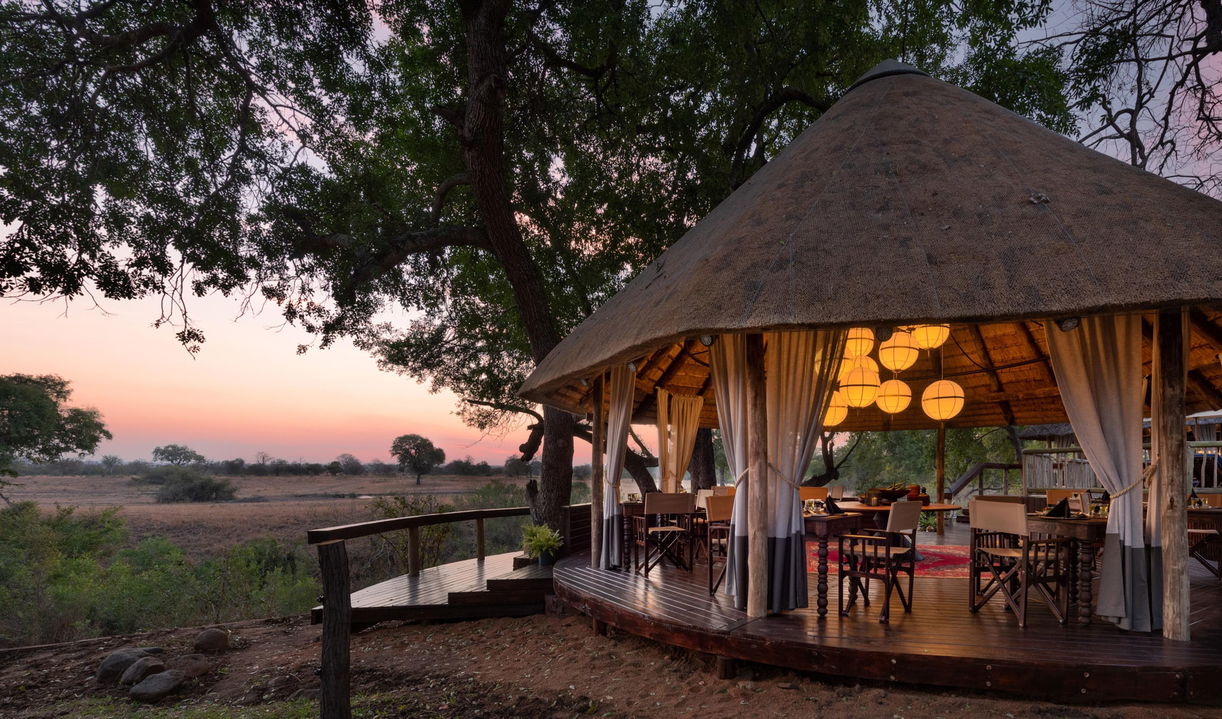 sunset view of main deck and viewing area of selati camp sabi sabi