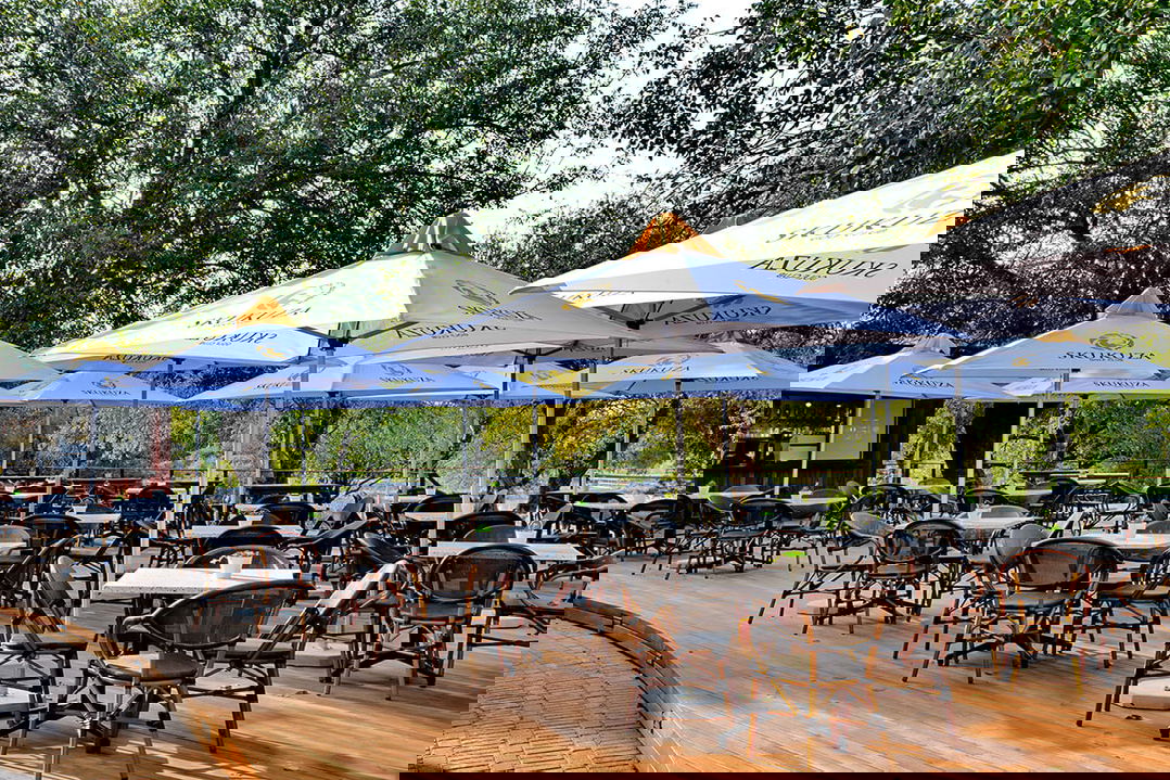 deck with chairs and tables at the clubhouse of Skukuza golf course 
