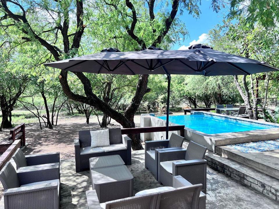 deck and pool area of secrets VIP safari lodge Marloth Park