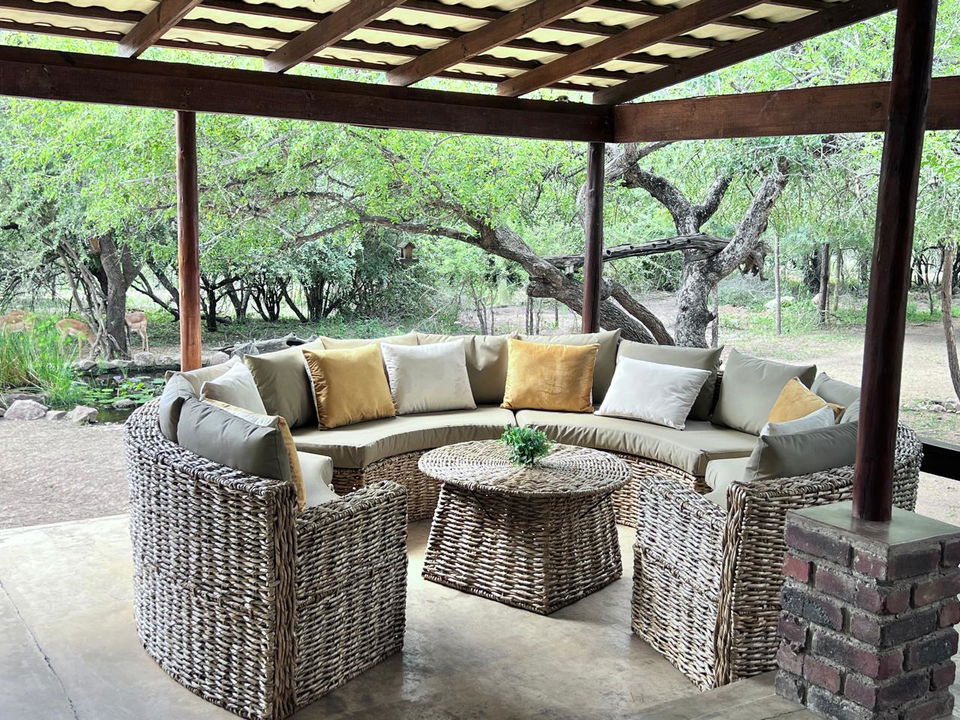 patio seating on deck at secrets VIP luxury lodge