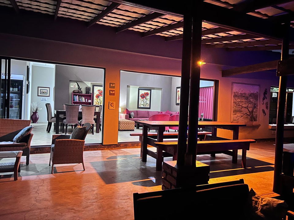 deck with dining area in background by secrets VIP luxury safari lodge