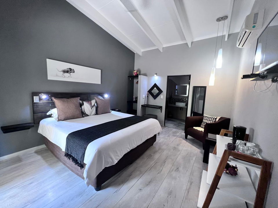 modern furnishing of interior of luxury room at secrets VIP safari lodge Komatipoort