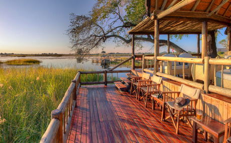 view of the deck at Belmond eagle island Okavango delta showing flood plains view of the deck at Belmond eagle island Okavango delta showing flood plains