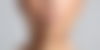 woman with finger on lip signalling to keep quiet
