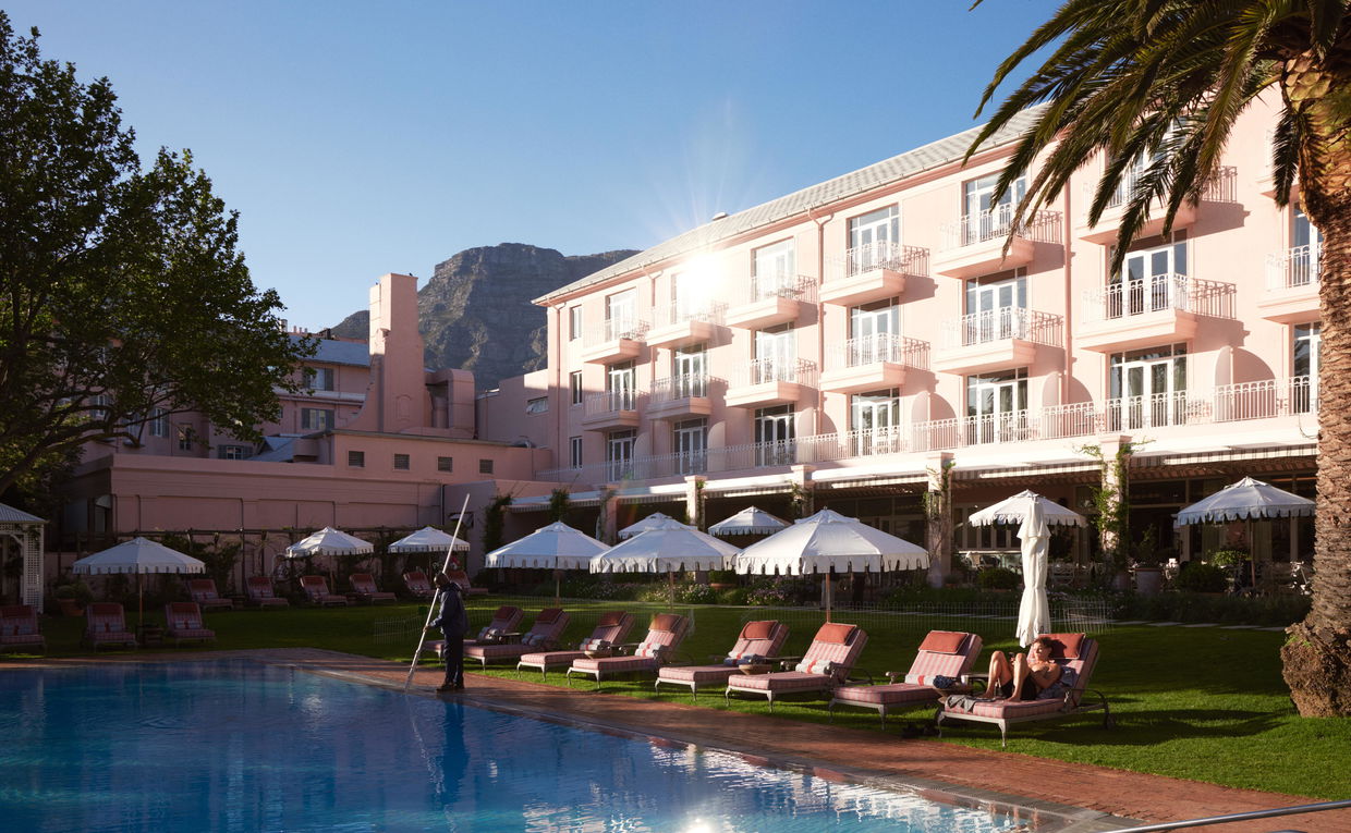 Pool Area with loungers and umbrellas at Mount Nelson Hotel Cape Town Pool Area with loungers and umbrellas at Mount Nelson Hotel Cape Town